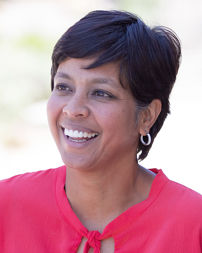 Smiling woman with a red shirt