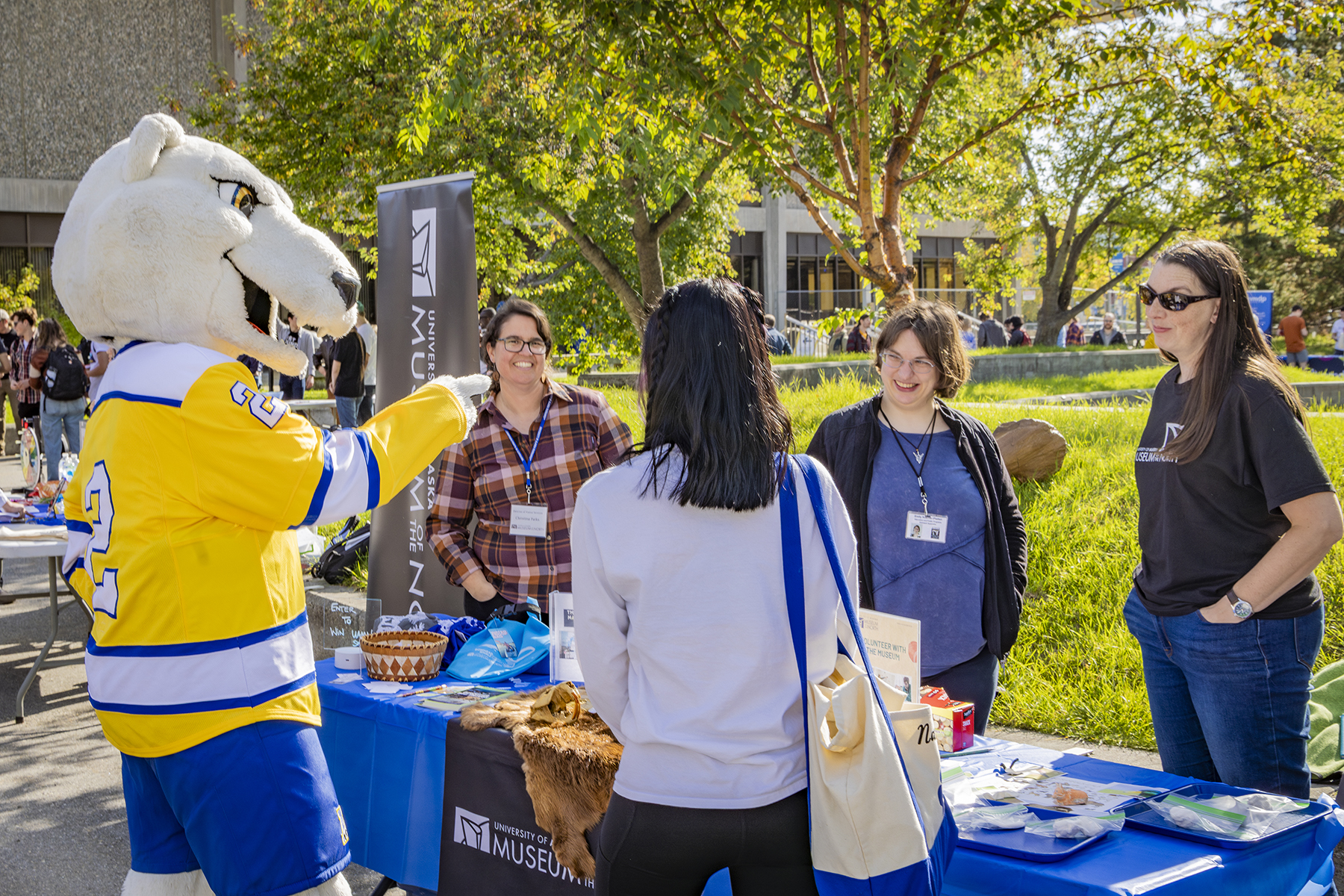 Nook visits the Museum of the North table at Party in the Park on the lower Troth Yeddha' Campus, Sep. 3, 2024.