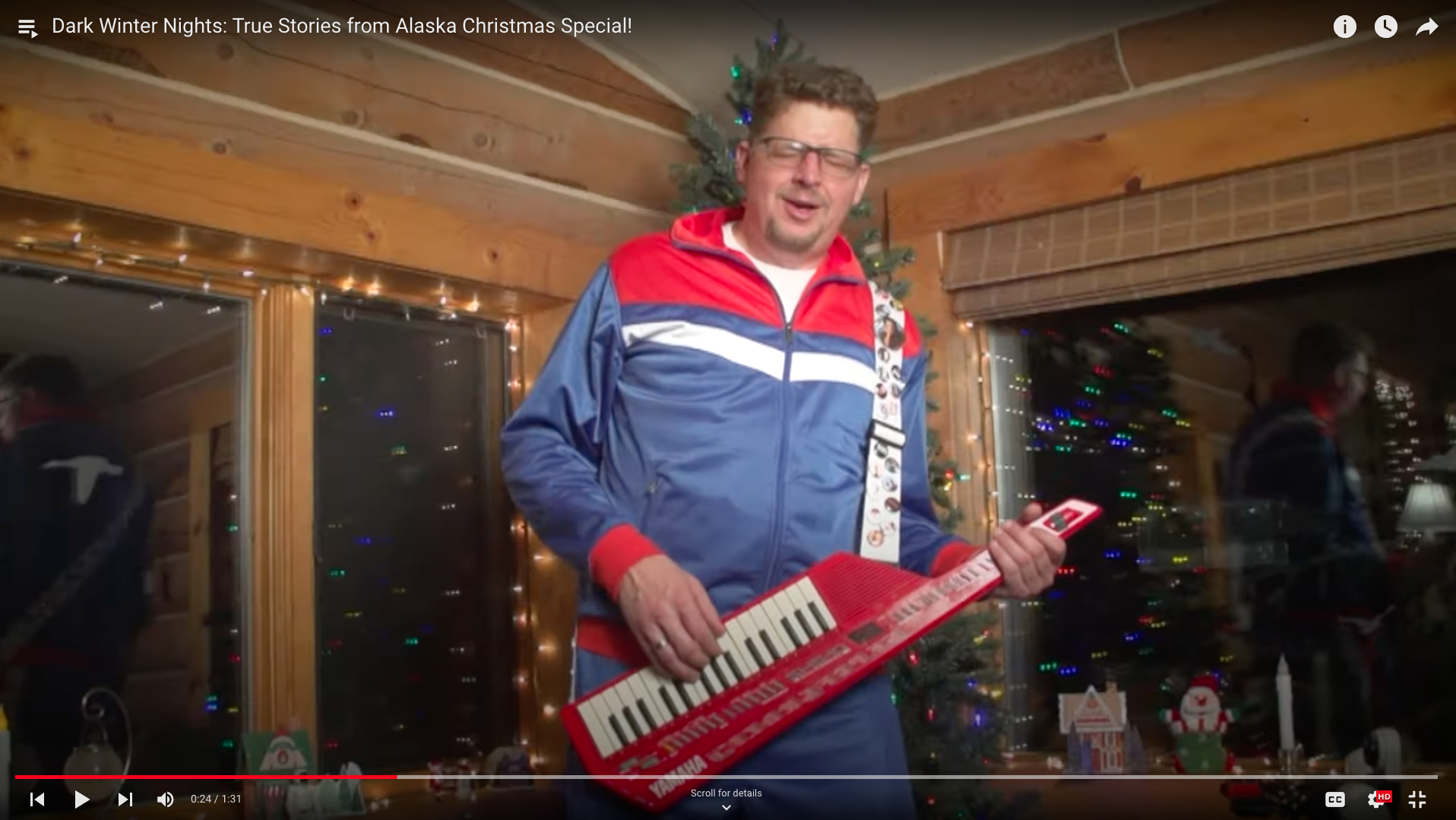 Rob Prince plays the keytar while hosting a Christmas party at his home for Dark Winter Nights: True Stories from Alaska Christmas Special debuting on Thursday, December 16 at 9:00pm on KUAC-TV channel 9.1. Photo Courtesy of Dark Winter Nights