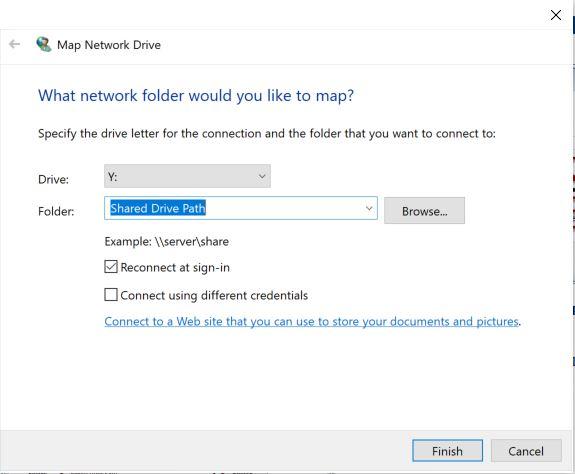 Map network drive window with two selection menus the top one is a dropdown that asks for the drive letter, and the menu below it with highlighted text asks for the folder path with a browse files button to the right. Below these menus are two checkboxes. The label for the top checkbox is recconect at sign-in and is checked.