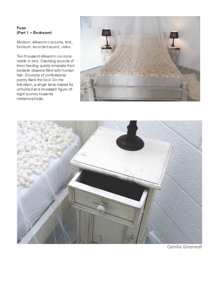 White bedroom with thousands of silkworm cocoons on the bed