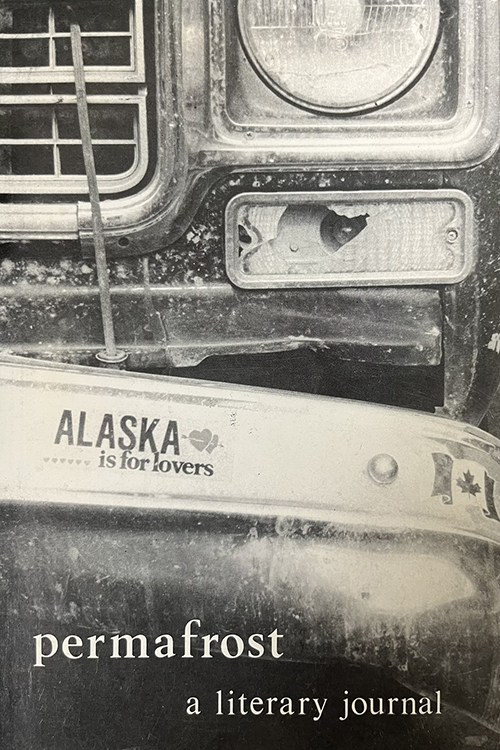 Close up of a front bumper hanging off of a truck with a bumper sticker that reads "Alaska is for Lovers"