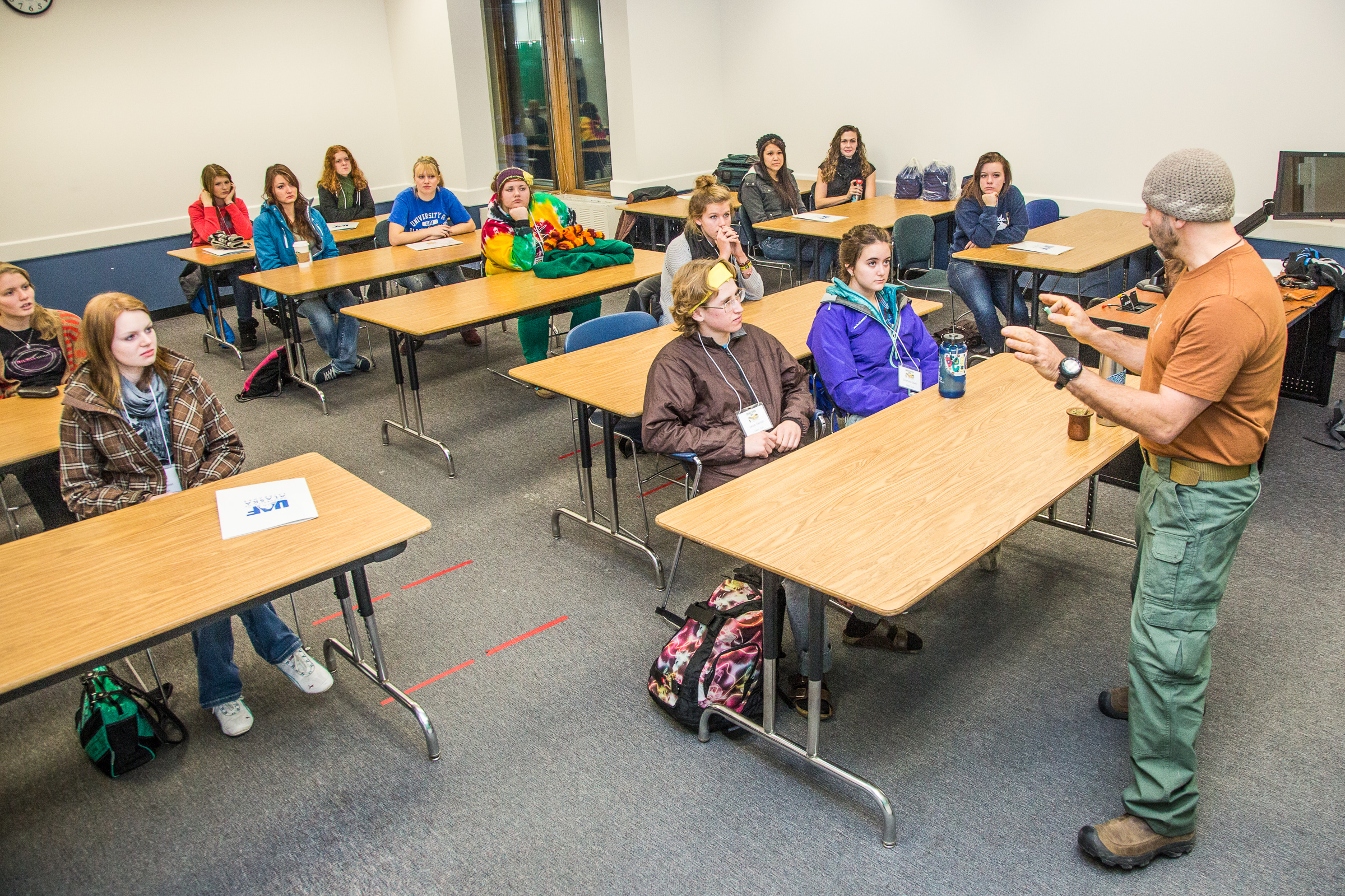 Assistant professor Eduardo Wilner leads a mock philosphy class  with high school seniors during an Inside Out event in a Gruening Building classroom. | UAF Photo by Todd Paris