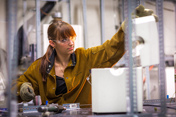 Ph.D. candidate Amanda Lindoo works in the Reichardt Building petrology lab. | UAF Photo by Todd Paris