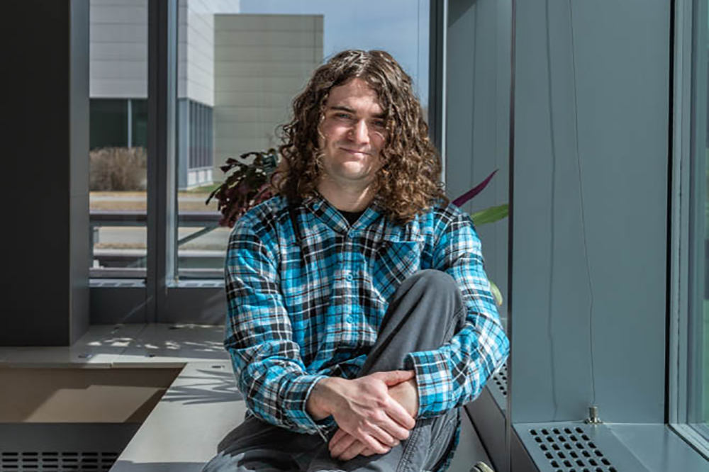 Support Philosophy Scholarships 2023 Outstanding Philosophy Student of the Year Andy Witteman poses for a photo | UAF Photo by Sarah Manriquez