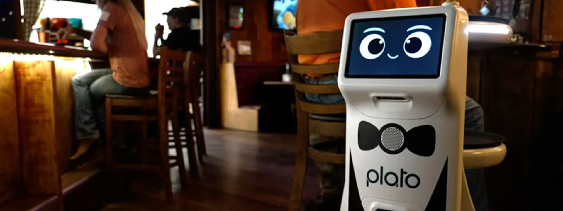 Plato waits 20 seconds after delivering an appetizer to a table in the bar section of The Cazadero July 5, 2023. (Hannah Ray Lambert/Fox News Digital)