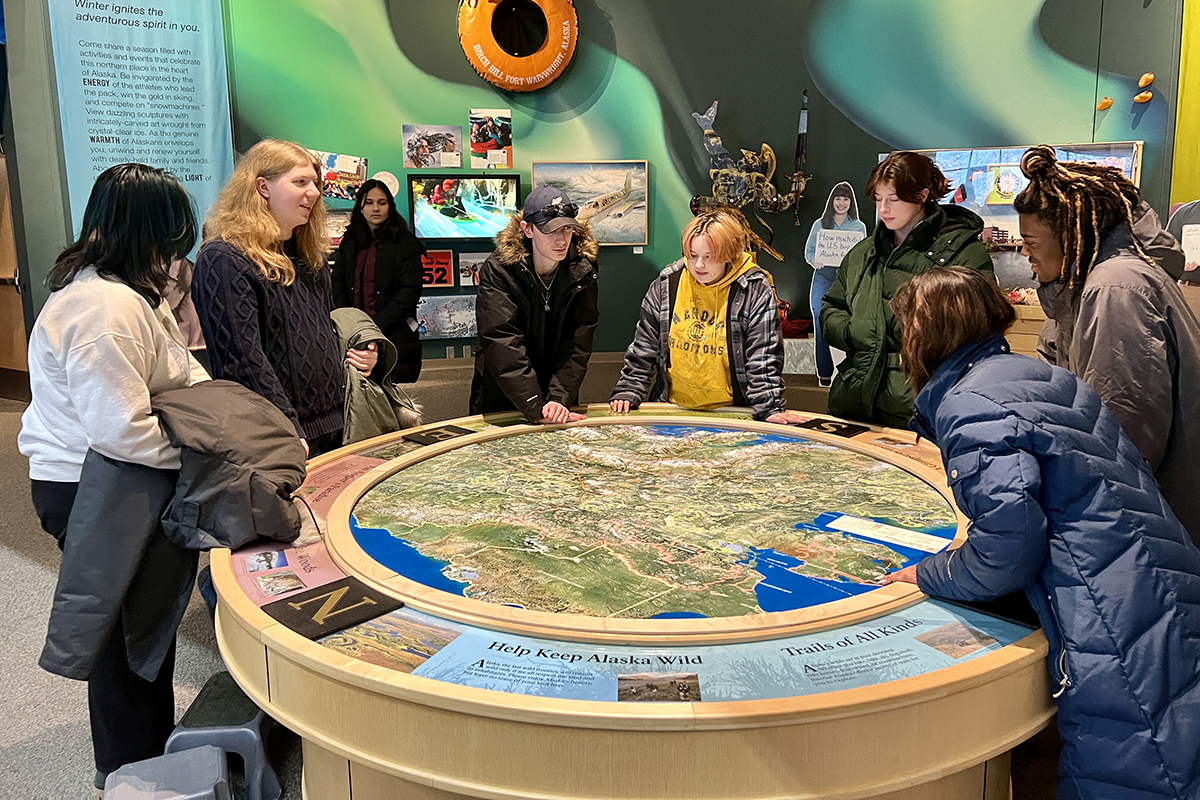 Students in Introduction to American Politics visited the Morris Thompson Cultural and Visitors Center to explore the political history of Alaska, from the Alaska Native Claims Settlement Act to language preservation efforts and the state's connections to the space program. UAF Photo by Carol Gray