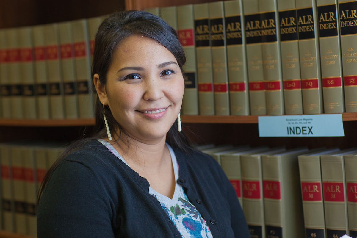 Melissa Charlie conducts some research for her paralegal studies class in the law library at CTC's law library. UAF Photo by Todd Paris