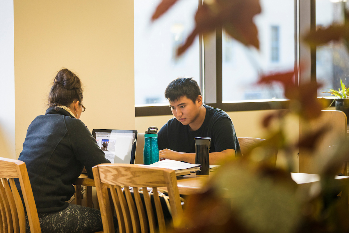 Laura Padget and Rodney J. Hilderbrand II, work quietly at the library's fourth floor quiet study area. UAF Photo by JR Ancheta