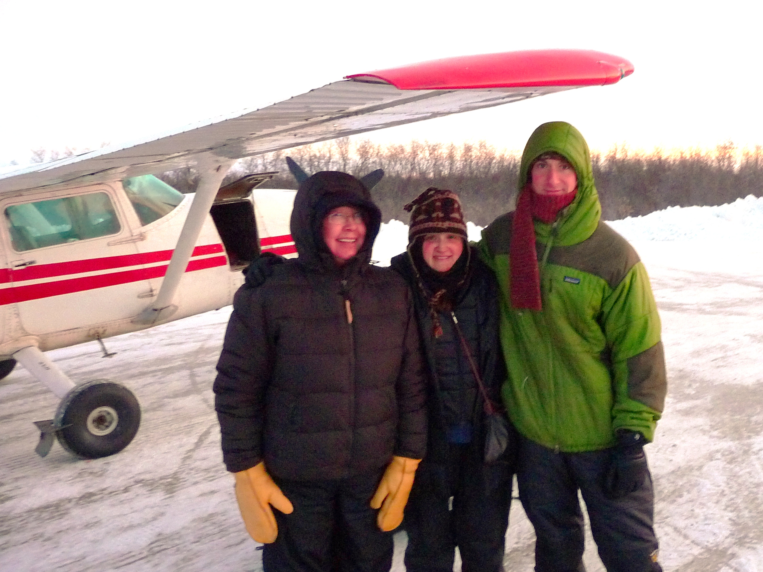 Dr. Rivkin & her research team waiting to board their bush plane after disseminating project findings in one of her partnering Yup’ik communities.. Photo courtesy of Rivkin