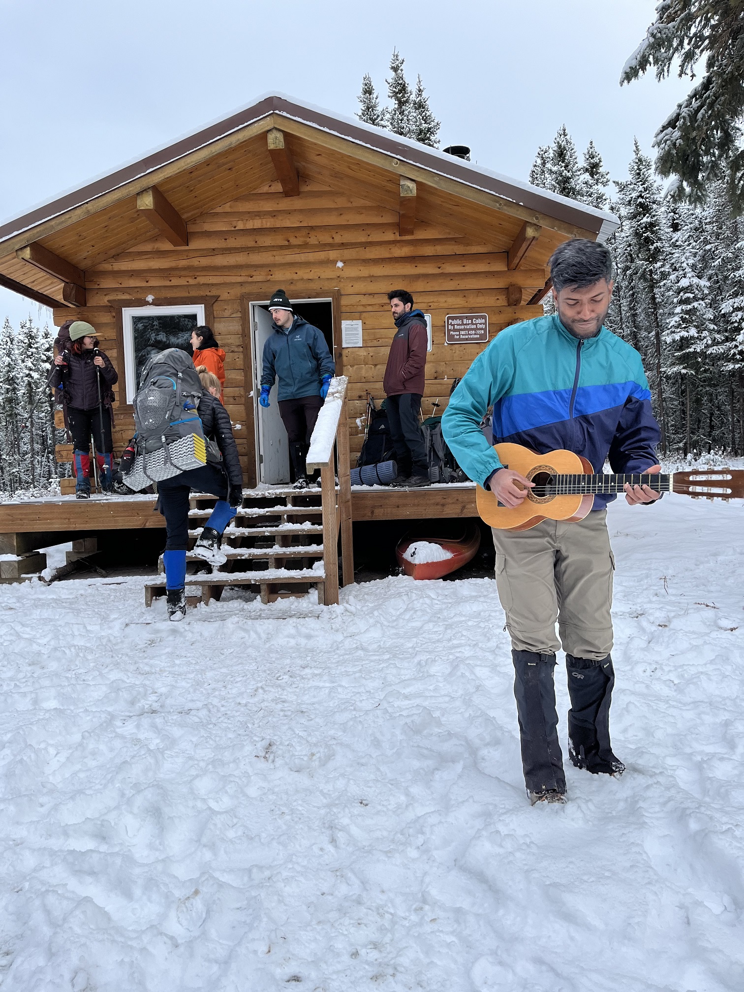 Playing guitar at the cabin Little Donna Lake Cabin