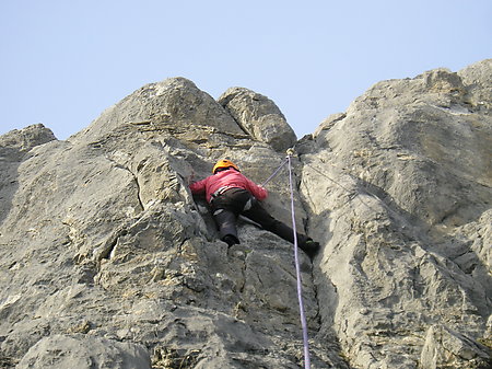 A climber reaching the top