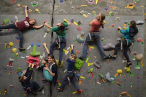 Kids climbing a wall