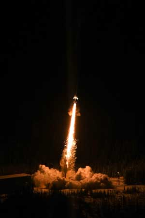 Dark nighttime rocket launch from PFRR 