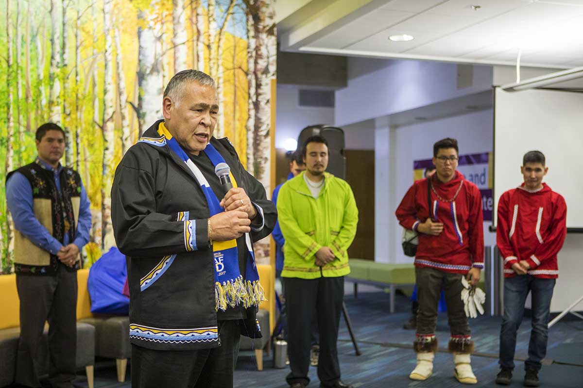 Students listen to an address during Indigenous Peoples' Day