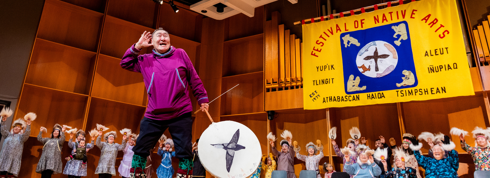 Drummer calls to crowd at the Festival of Native Arts