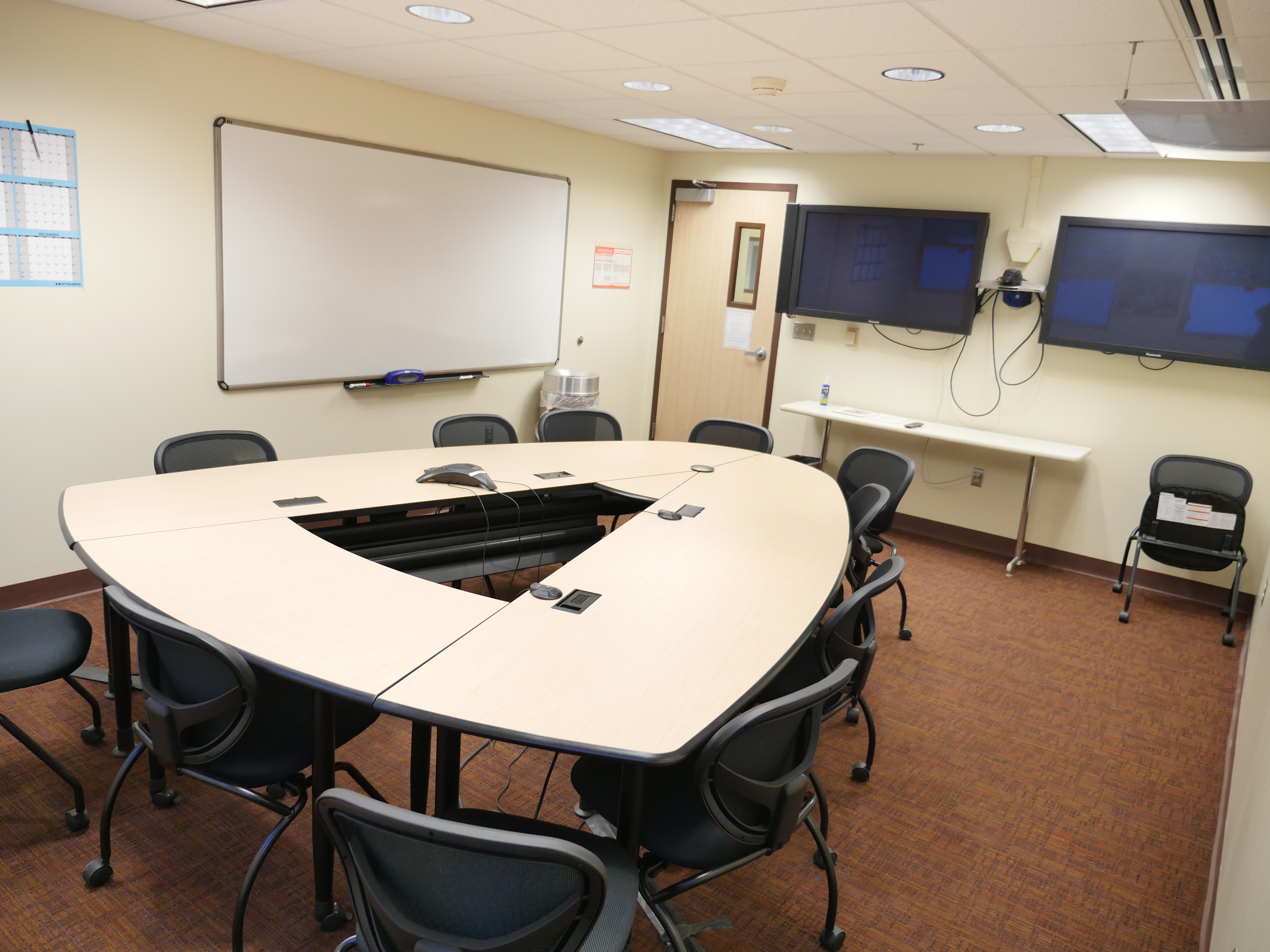 Conference room facing the entrance
