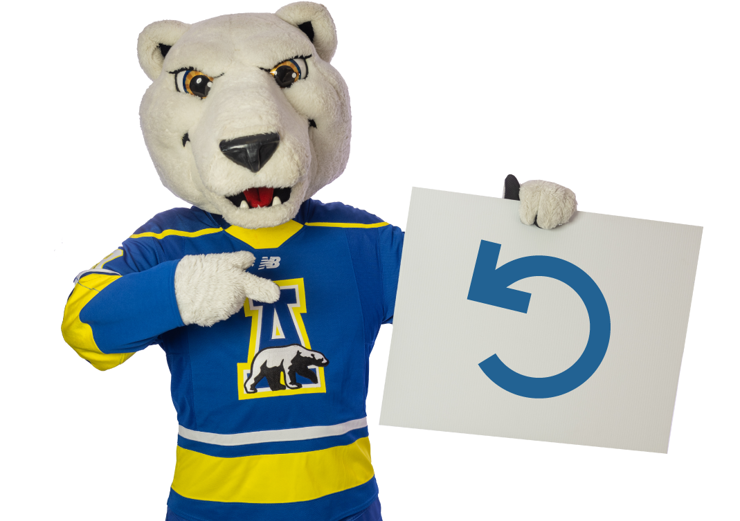 Nanook Mascot holding a sign with a reset icon