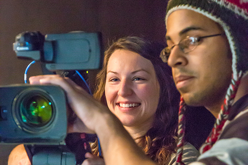 Two film students behind the camera