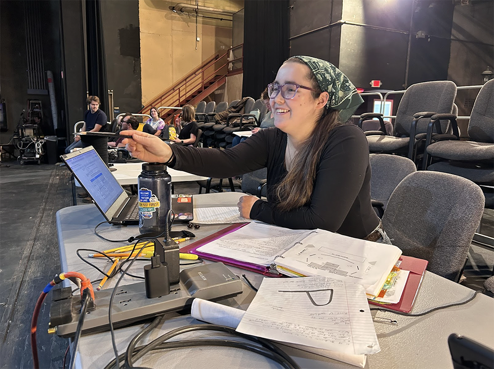 Zorissa James manages the stage at a rehearsal for Historical Comical on Oct. 27. Photo credit: Kade Mendelowitz