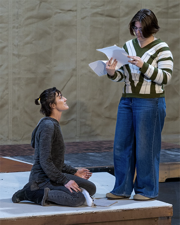 Left to right: Emily Yates and Kylee Cole at a stumble through rehearsal for Historical Comical. UAF Photo by Kade Mendelowitz