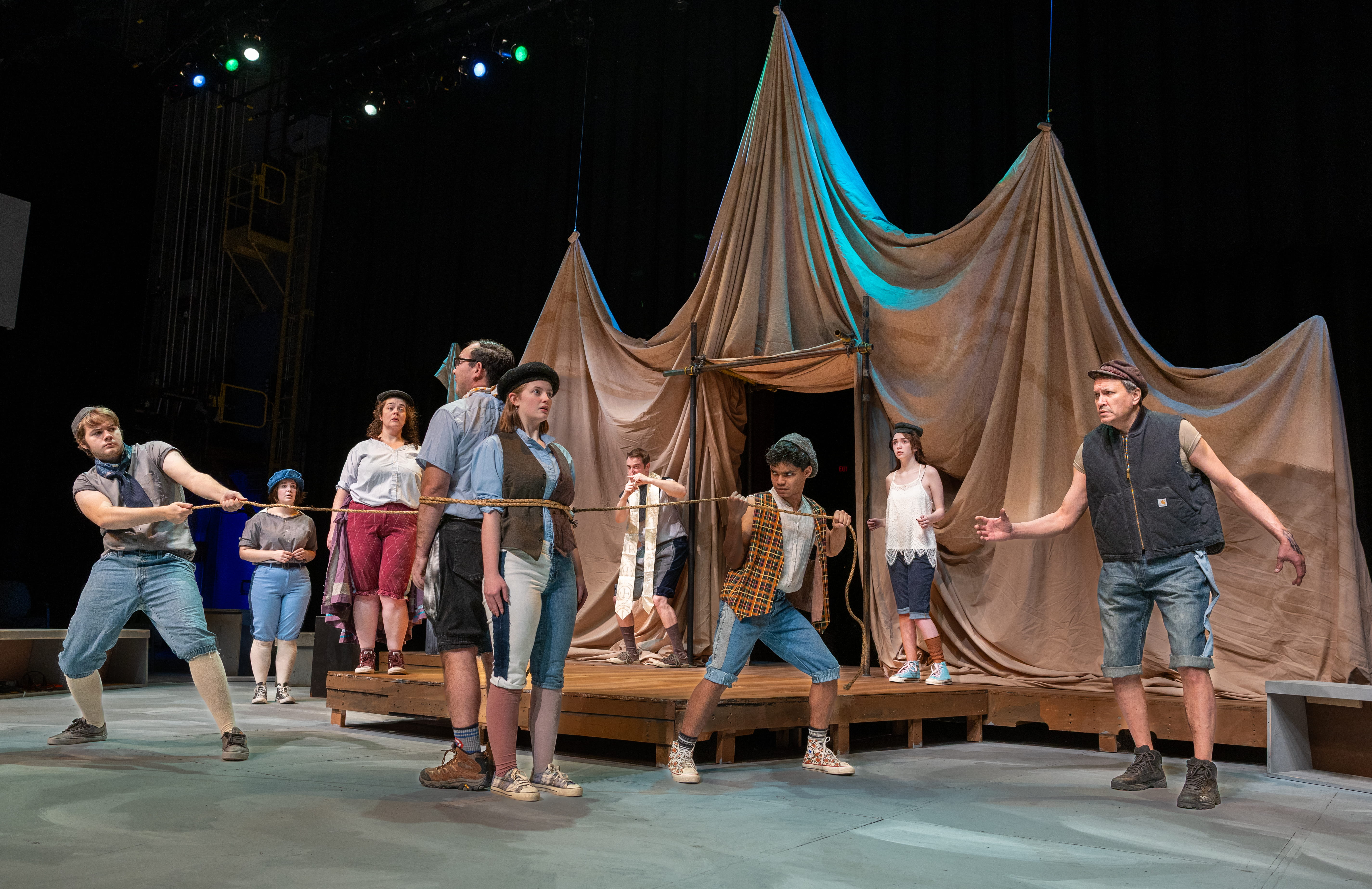 “Dr. Pinch ties up Antipholus of Ephesus and Dromio of Ephesus” (Left-right): Logan Ehrhart, Kaylee Cole, Rachel Blackwell, Matthew Herrera, Emily Cooley, Levi Ben-Israel, Tim Hall, Daisy Massey and Don Crowe. From “Comedy of Errors”, part of Theatre UAF’s production of “Historical Comical: A Shakespeare Double Bill” directed by Tom Robenolt running November 7-16, 2025. https://www.uaf.edu/theatrefilm/ Photo by Kade Mendelowitz, Theatre UAF