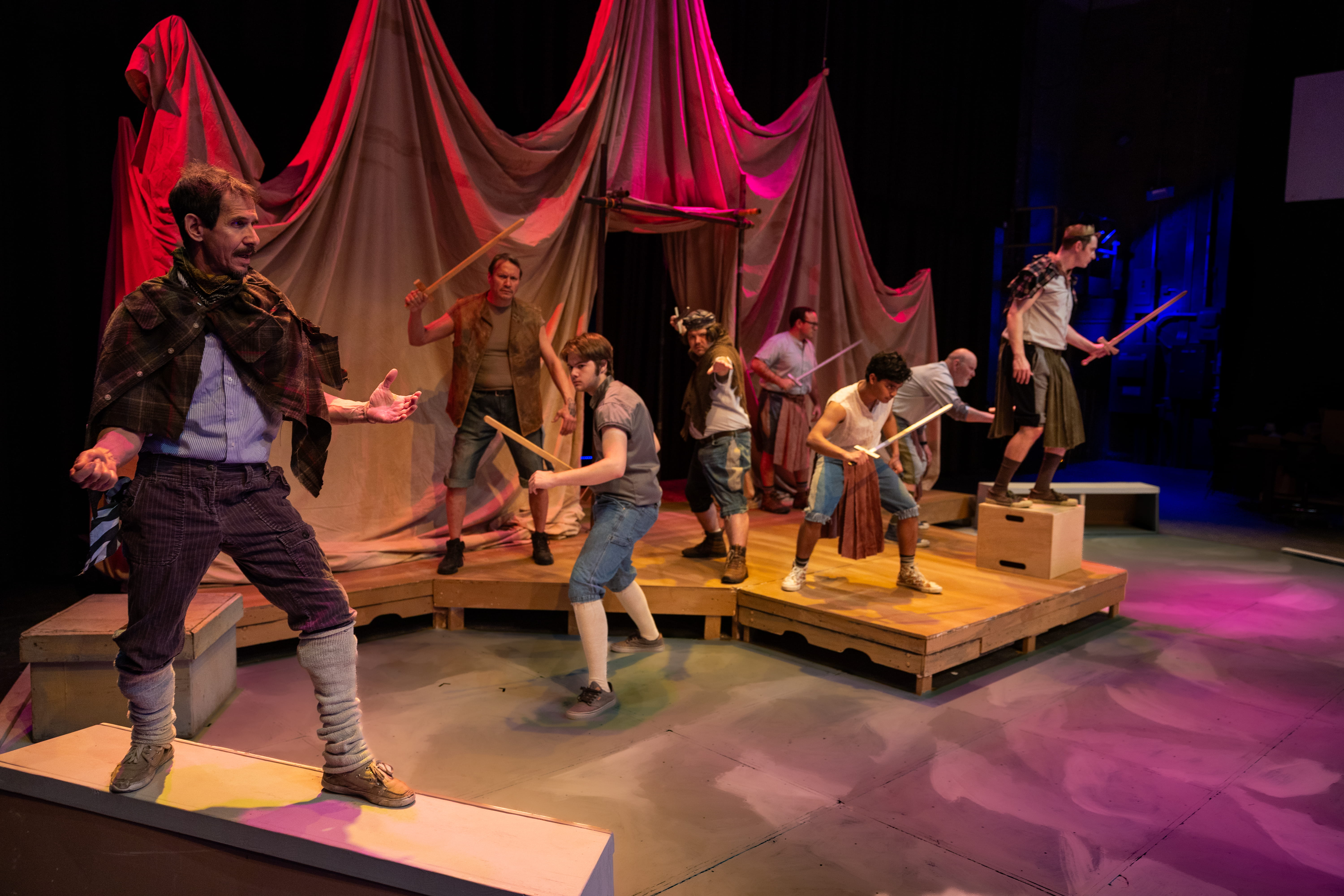 “Charge into Harfleur” (Left-right for #2): Nicholas Glovin, Don Crowe, Logan Ehrhart, John DiCandeloro, Matthew Herrera, Tim Hall, Bruce Hanson and Levi Ben-Israel. From “Henry V”, part of Theatre UAF’s production of “Historical Comical: A Shakespeare Double Bill” directed by Tom Robenolt running November 7-16, 2025. https://www.uaf.edu/theatrefilm/ Photo by Kade Mendelowitz, Theatre UAF