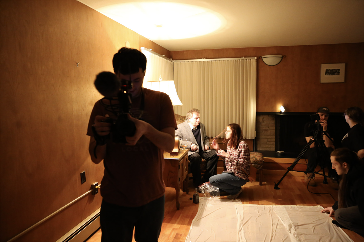 Strange Embrace BTS Cast and crew prepare for filming on the set of Strange Embrace. UAF Photo by Maya Salganek