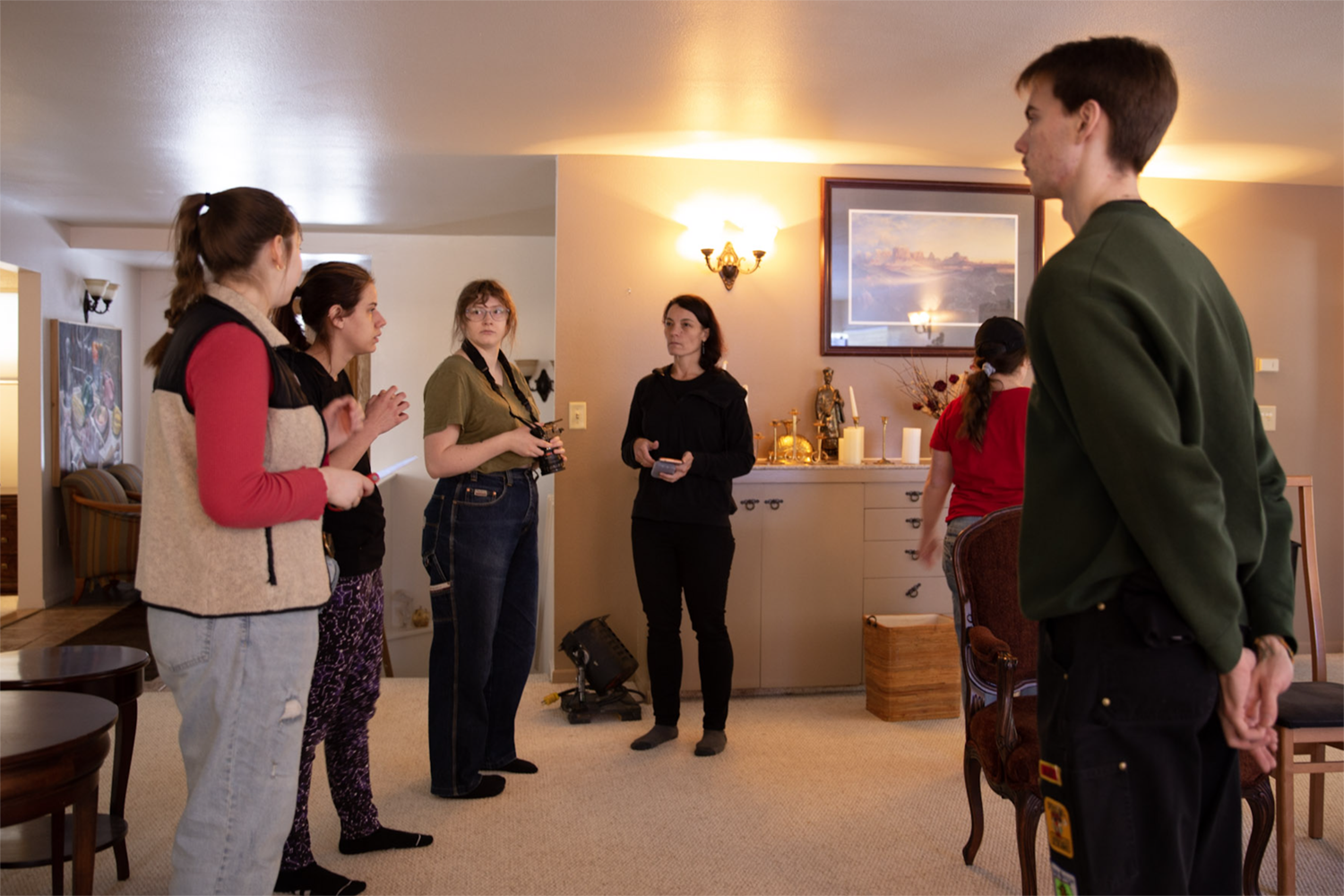 Strange Embrace Cast and crew gather to discuss the filming of Strange Embrace. UAF Photo by Maya Salganek