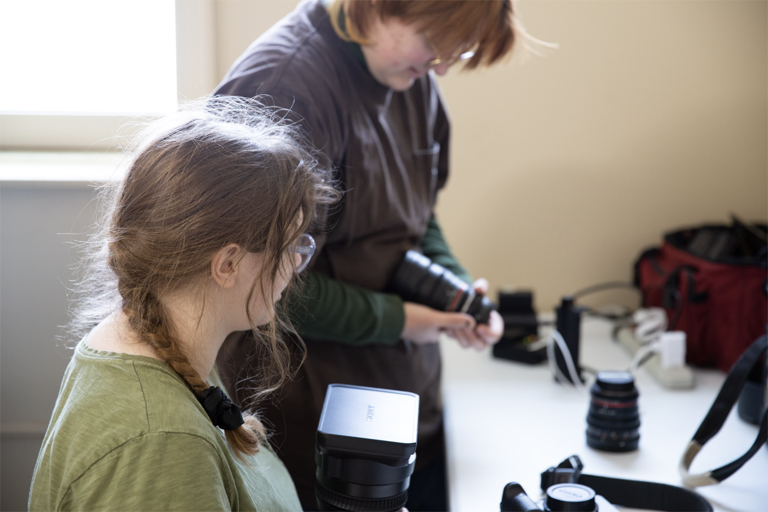 Strange Embrace BTS Crew prepping cameras on the set of Strange Embrace. UAF Photo by Maya Salganek