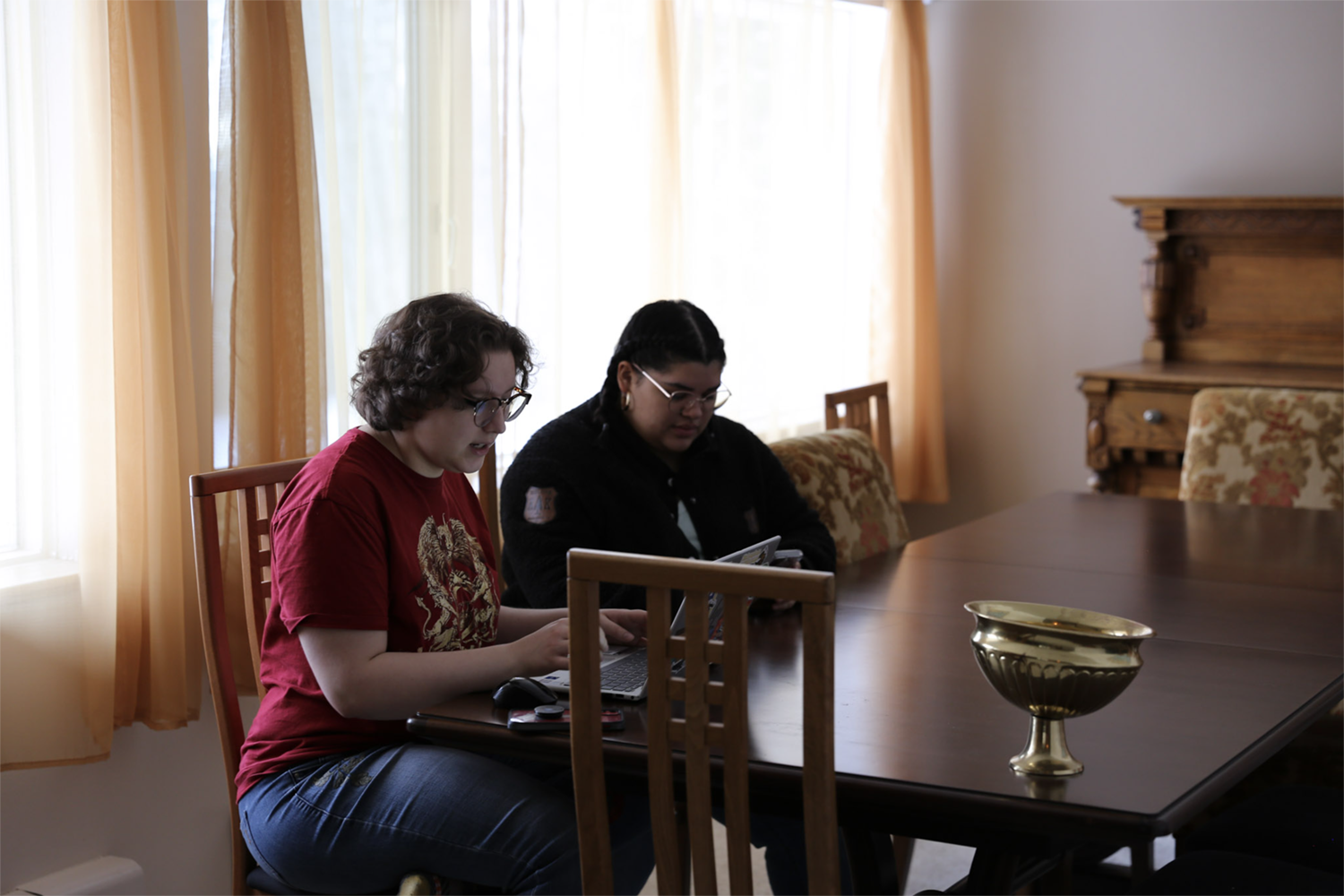 Strange Embrace BTS Two crew planning on the set of Strange Embrace. UAF Photo by Maya Salganek