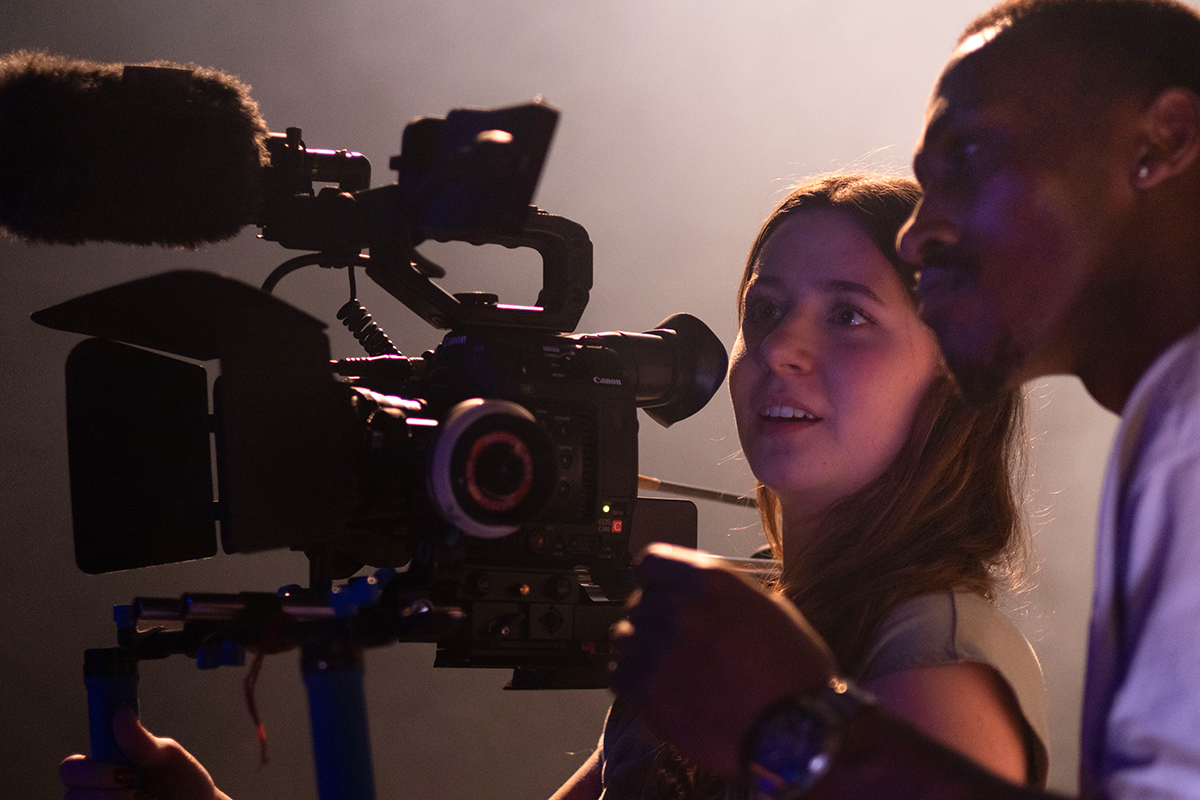 TAOS, Day 1, image 324 Chloe Miller and Dre Williams behind the camera during filming. Photo credit: Eric Marshall