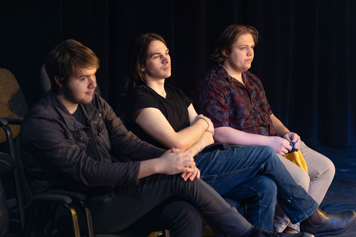 TAOS, Day 1, image 94 (left to right) Logan Ehrhart, Clark Milstead, and Graham Granger, crew members of the Anatomy of Sound, watch filming from the theatre seats. Photo credit: Eric Marshall