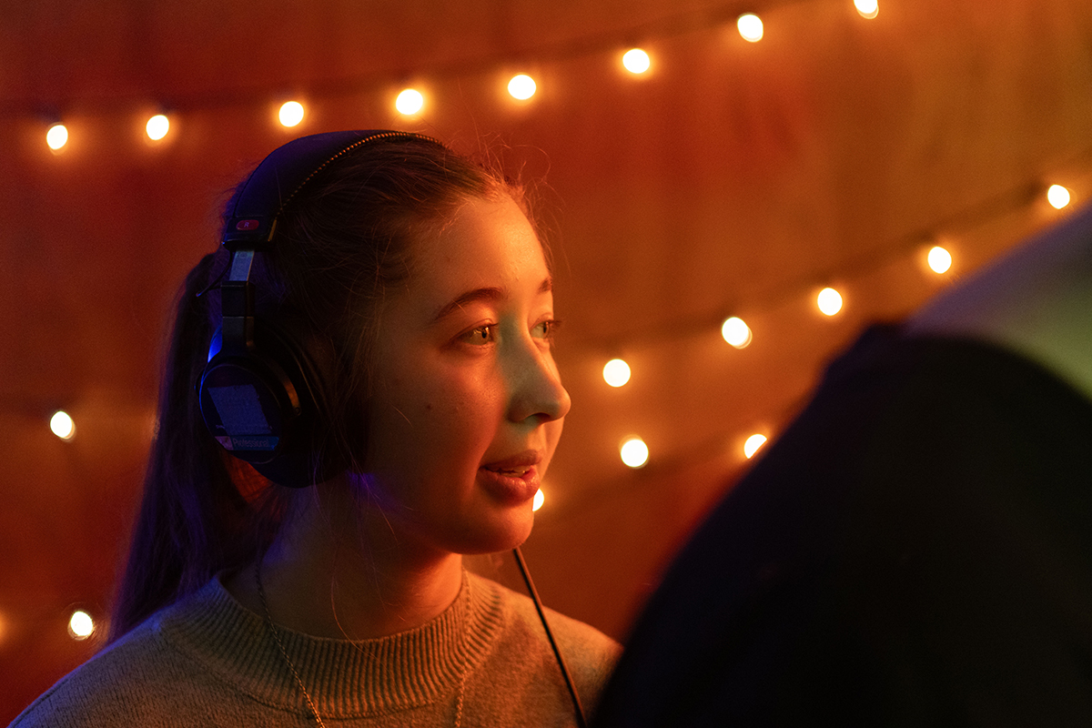 TAOS, Day 6, image 53 Danielle Beks in headphones awaits instructions on the set of The Anatomy of Sound. Photo credit: Eric Marshall