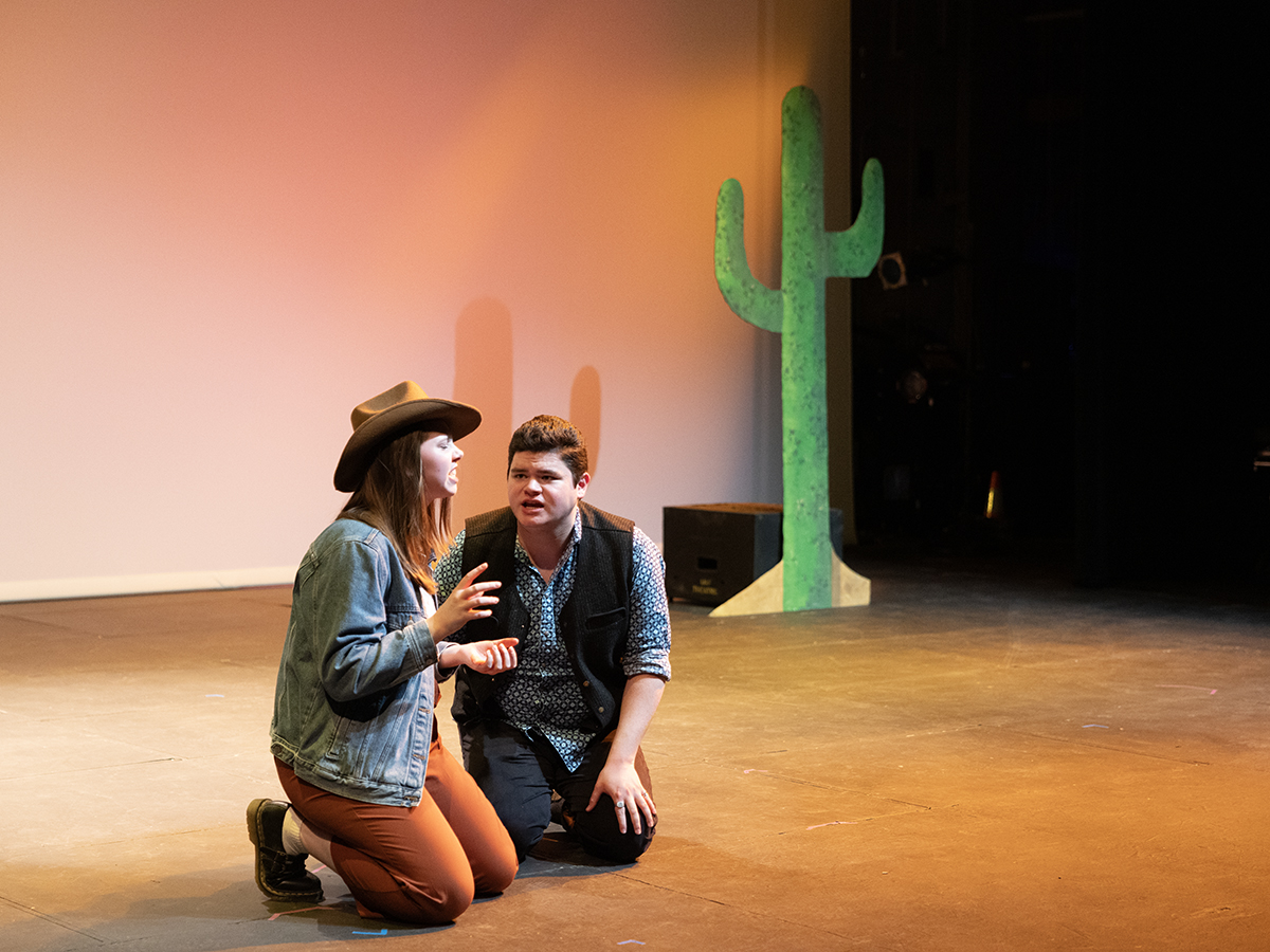 Two actors on stage during the UAF Student Drama Association's Extravangaza '25. Photo courtesy of SDA