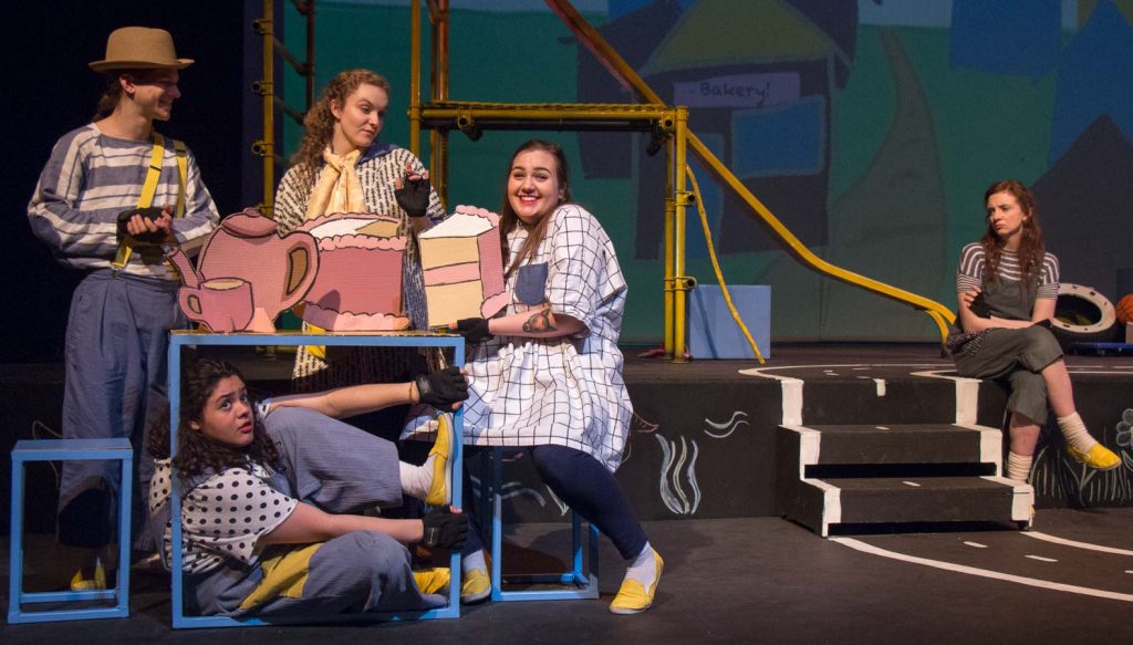 “This Girl Laughs, This Girl Cries, This Girl Does Nothing” featuring Paloma Polanco (front row, seated in a square) and (back row, from left to right) Freddy Gryder, Mary Conlin, Paloma Polanco, Emily Ross, and Sarah Williams.
