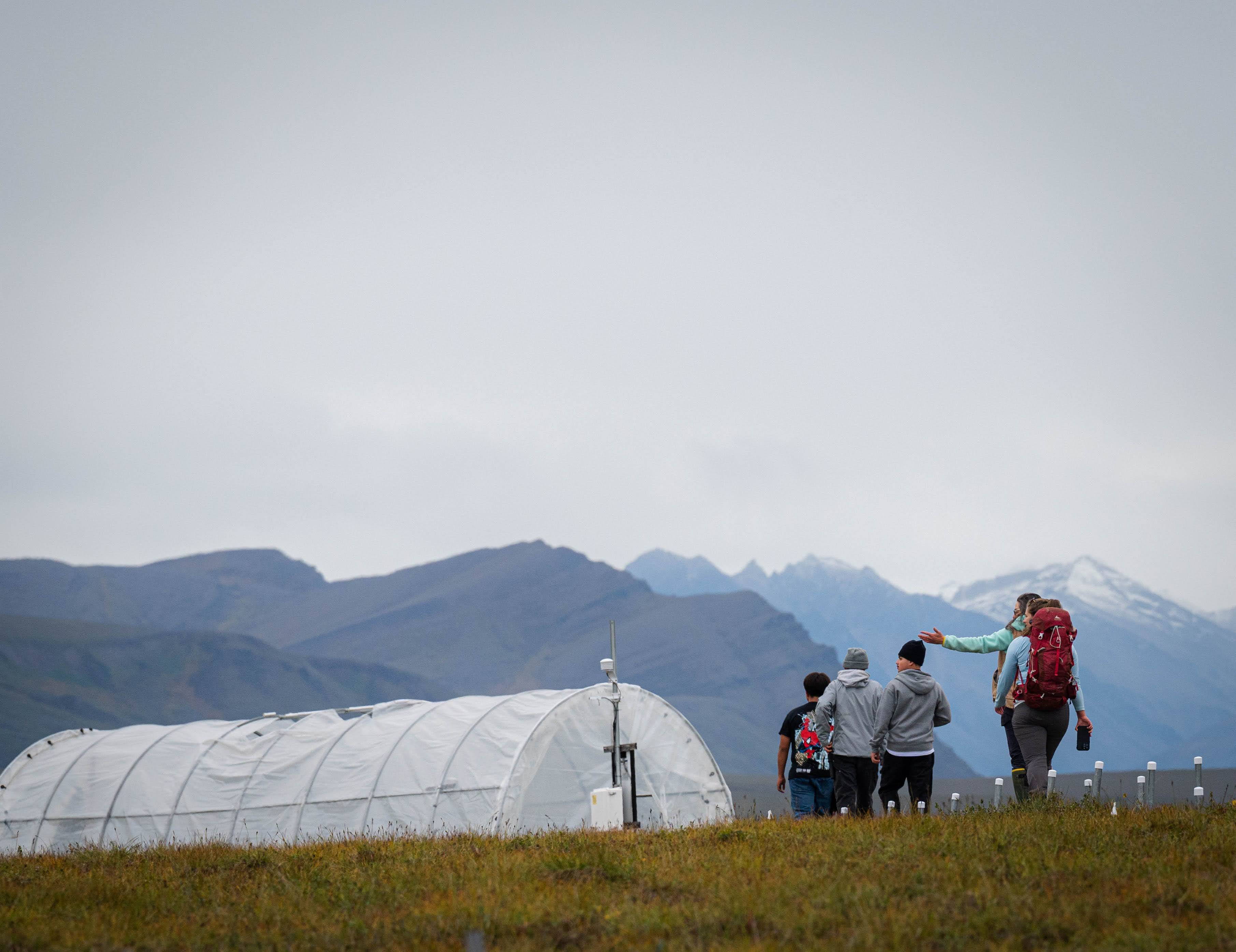 students taking a tour of research sites at Toolik