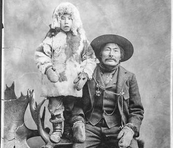 Chief Isaac and his son, Dawson, Y.T., 1899. 