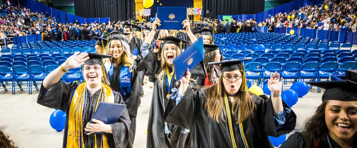 Students celebrate at the UAF commencement ceremony at the Carlson Center in Fairbanks.