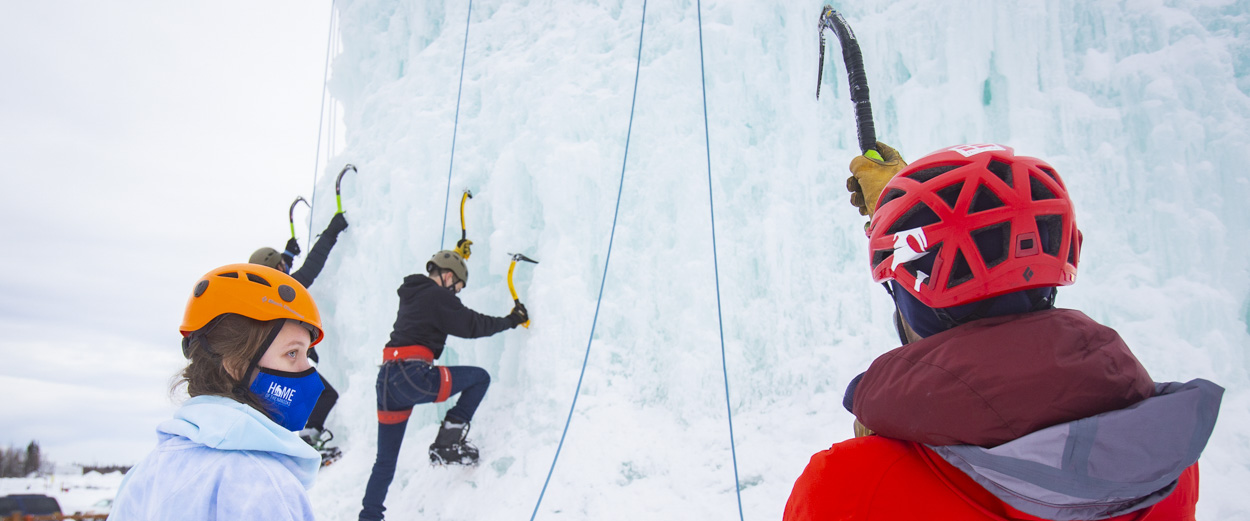 A group of UAF students climbing the ice wall outside the Student Recreation Center in Fairbanks.