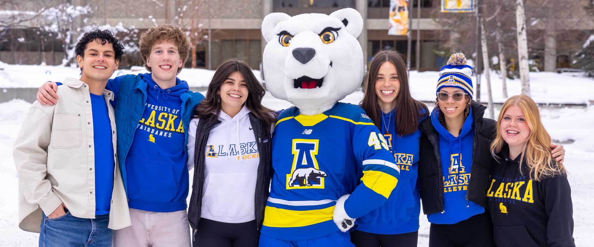 Group photo of UAF students posing with Nanook Mascot.