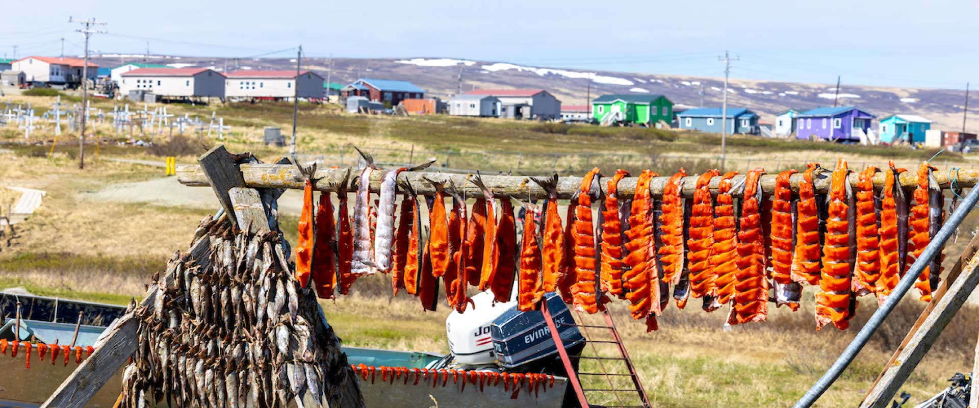Herring and salmon hang from a drying rack in the village of Toksook Bay.