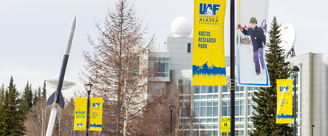Arctic Research Park banners line the streets of UAF's West Ridge