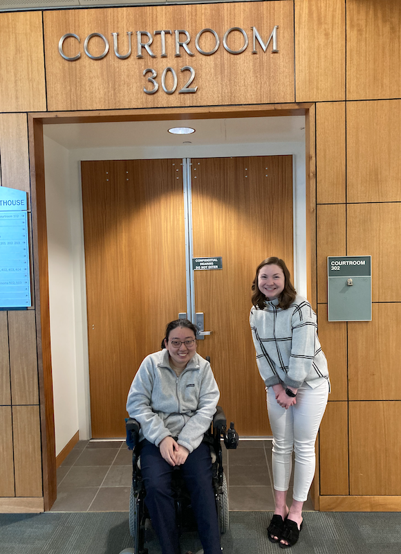 Jung Woo Maeng and Jillian McCarley, Summer 2023 Internship Awardees, in front of a courtroom in Fairbanks.