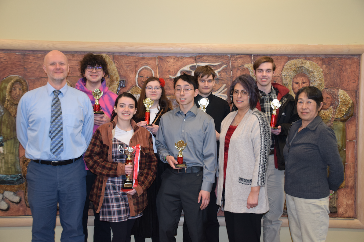 Japanese Language Group poses with awards at the competition