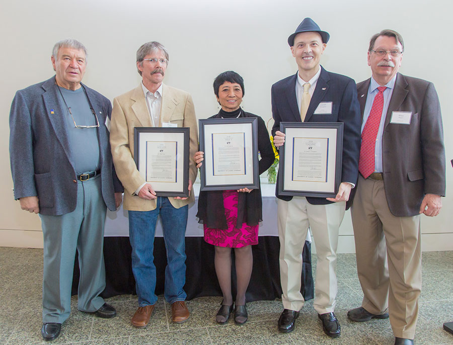 Joe Usibelli, far left, joins Chancellor Brian Rogers at right, in a photo this evening at the University of Alaska Museum of the North with the 2014 Usibelli Award Winners. UAF faculty members Roger Ruess was honored for his research efforts, Elena Sparrow for her outstanding service, and Joseph Thompson for exemplary teaching.