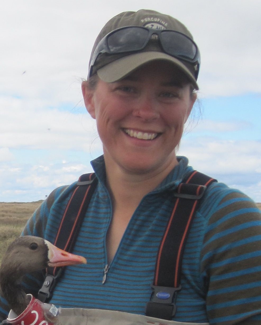Cristina (Nina) Hansen holds a white-fronted goose.