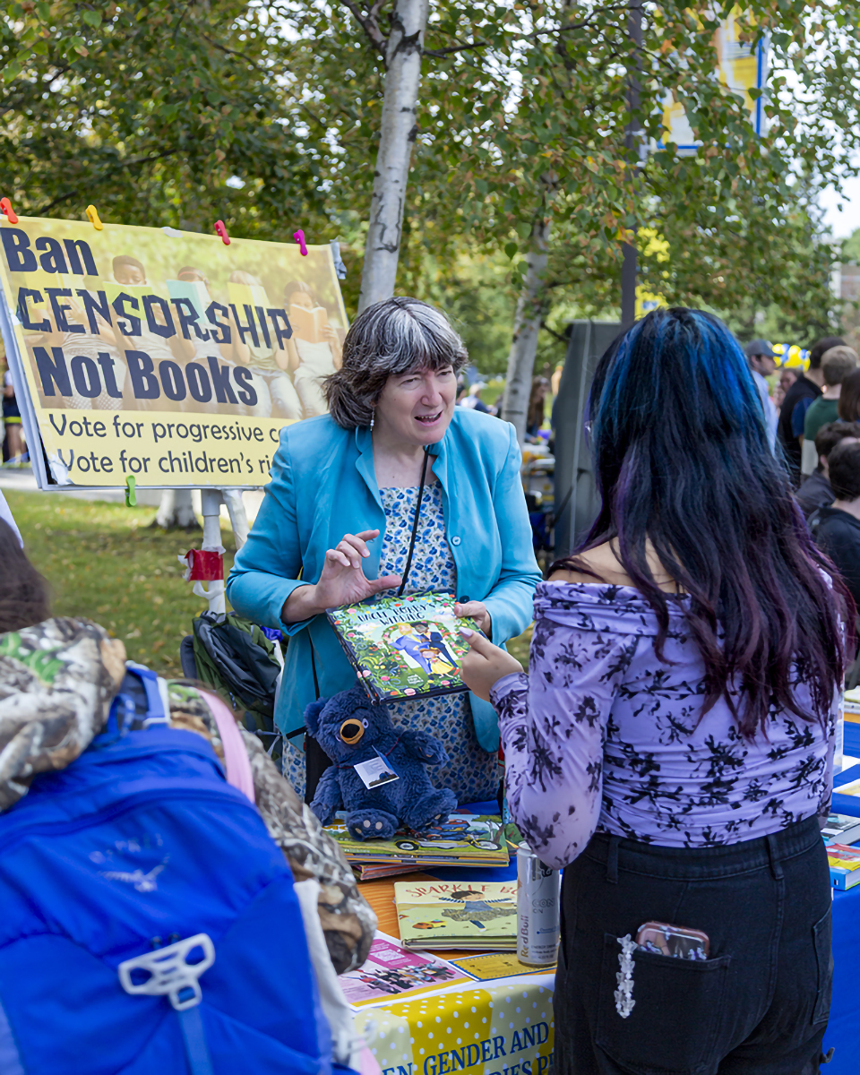 Program Coordinator Carol Gray Program Coordinator Carol Gray talks to a students about the upcoming mock trial on banned books. Fall 2025. UAF Photo by Sarah Manriquez
