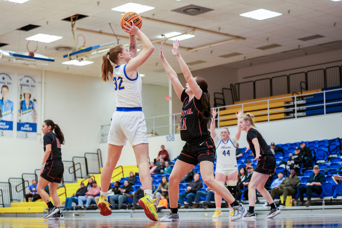 Kayla Johnson (#32) shoots the ball as the Nanooks Womens Basketball Team plays Central Washington University for staff and faculty appreciation night at the Patty Center Gym, 2/15/24. (UAF photo by Leif Van Cise)